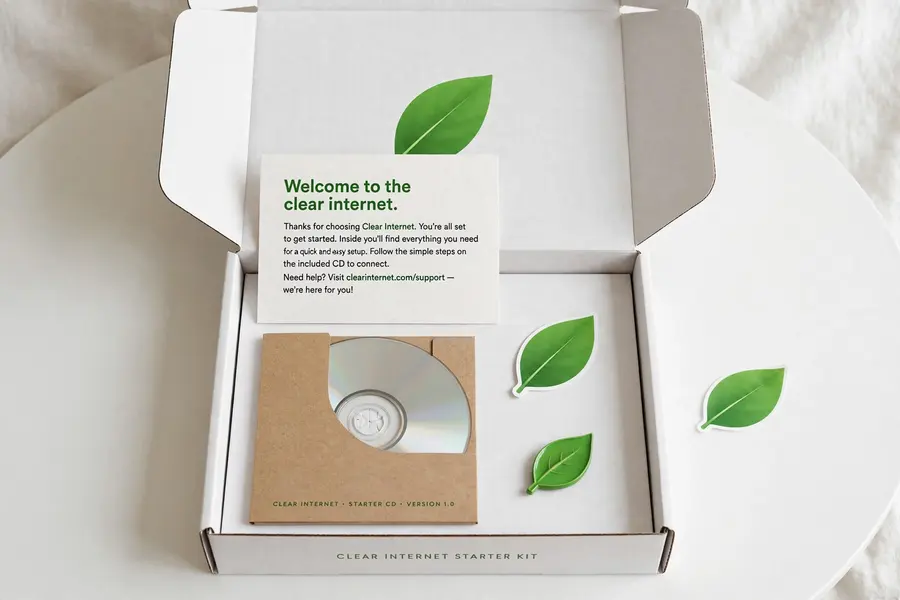 Clear Internet starter kit box with CD, sticker, letter, and magnet